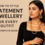 Elegant woman wearing gold statement earrings, layered necklaces, and rings, showcasing how to style statement jewellery for different outfits.